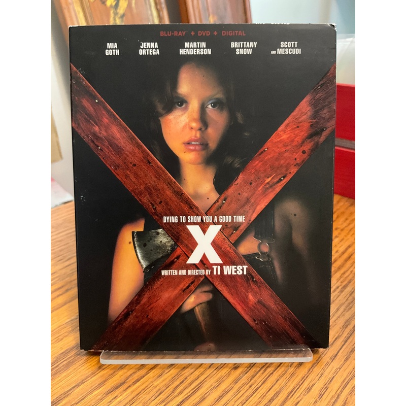 X  (Ti West) w/SLIP USED