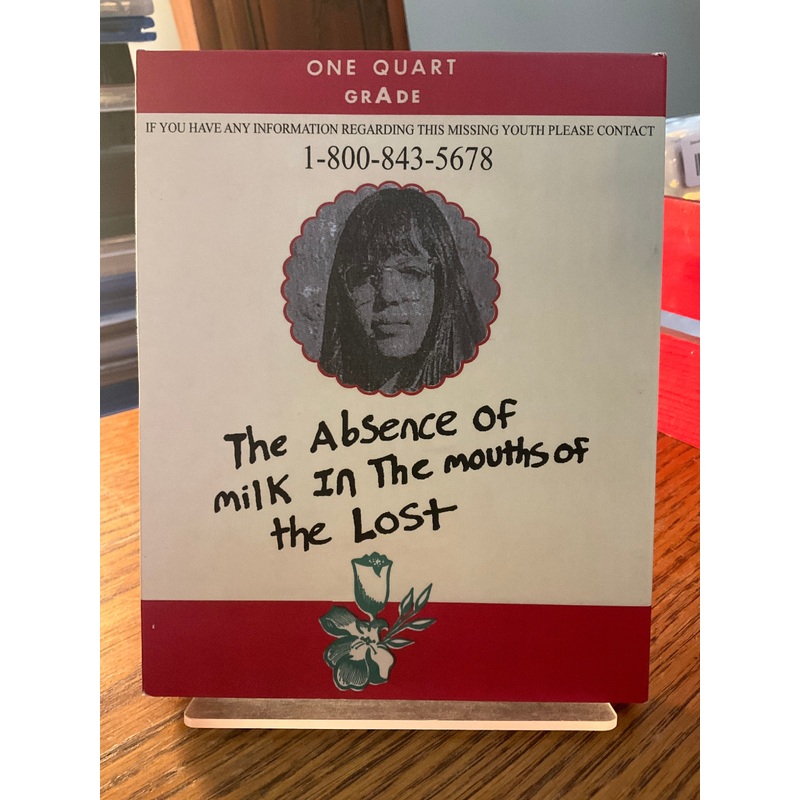 The Absence of Milk In the Mouths of the Lost w/SLIP AND BOOKLET USED